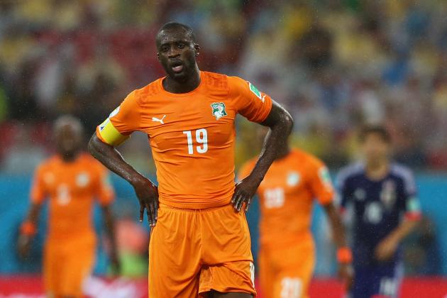 RECIFE, BRAZIL - JUNE 14: Yaya Toure of the Ivory Coast looks on in the rain during the 2014 FIFA World Cup Brazil Group C match between the Ivory Coast and Japan at Arena Pernambuco on June 14, 2014 in Recife, Brazil. (Photo by Jamie Squire/Getty Images)