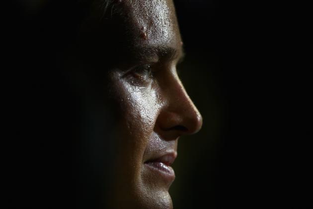 SINGAPORE - SEPTEMBER 20:  Nico Rosberg of Germany and Mercedes GP speaks with members of the media after qualifying ahead of the Singapore Formula One Grand Prix at Marina Bay Street on September 20, 2014 in Singapore, Singapore.  (Photo by Clive Mason/Getty Images)