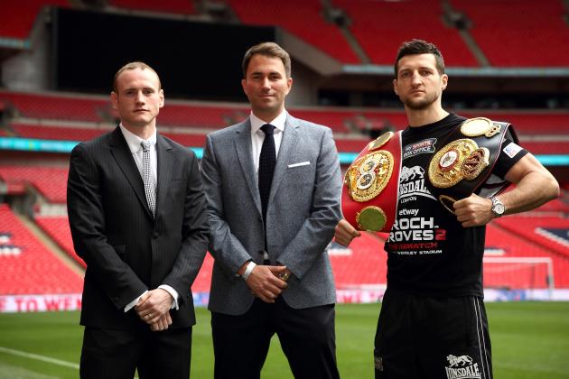 LONDON, ENGLAND - MAY 29:  Promoter Eddie Hearn stands inbetween Carl Froch and George Groves as they go head to head during a press conference to announce the upcoming WBA & IBF Super Middleweight World Championship fight between Carl Froch and George Groves at Wembley Stadium on May 29, 2014 in London, England.  (Photo by Jordan Mansfield/Getty Images)