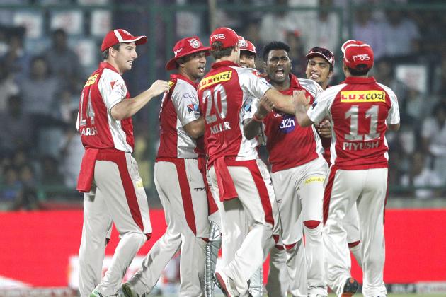 Kings XI Punjab Parvinder Awana , third left,celebrates the wicket of Delhi Daredevils' Ross Taylor,unseen,  during an Indian Premier League (IPL) cricket match, in New Delhi, India , Tuesday, May 15, 2012.  (AP Photo/ Manish Swarup)