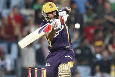 Kolkata Knight Riders's batsman Manoj Tiwary plays a shot from Delhi Daredevils's bowler Umesh Yadav, unseen, during the  Champions League Twenty20 cricket match at the Centurion Park in Pretoria, South Africa, Saturday, Oct. 13, 2012. (AP Photo/ Themba Hadebe)