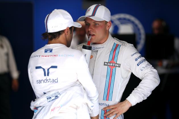 HOCKENHEIM, GERMANY - JULY 19:  Felipe Massa of Brazil and Williams speaks with Valtteri Bottas of Finland and Williams after they claimed third and second place on the grid respectively during qualifying ahead of the German Grand Prix at Hockenheimring on July 19, 2014 in Hockenheim, Germany.  (Photo by Mark Thompson/Getty Images)