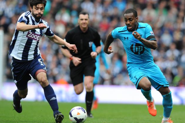 West Brom's Claudio Yacob, left, and Tottenham's Danny Rose during  the English Premier League soccer match between West Bromwich Albion and Tottenham Hotspur at The Hawthorns Stadium in West Bromwich, England, Saturday, April 12, 2014.  (AP Photo/Rui Vieira)