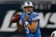 DETROIT, MI - SEPTEMBER 21: Matthew Stafford #9 of the Detroit Lions looks to throw a second quarter pass against the Green Bay Packers at Ford Field on September 21, 2014 in Detroit, Michigan. (Photo by Gregory Shamus/Getty Images)