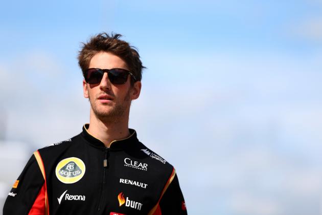 NORTHAMPTON, ENGLAND - JULY 04:  Romain Grosjean of France and Lotus walks through the paddock after practice ahead of the British Formula One Grand Prix at Silverstone Circuit on July 4, 2014 in Northampton, United Kingdom.  (Photo by Mark Thompson/Getty Images)