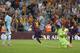 Barcelona's Lionel Messi from Argentina, center, celebrates scoring his side's sixth goal during a Spanish La Liga soccer match between F.C. Barcelona and Granada C.F. at the Camp Nou stadium in Barcelona, Spain, Saturday, Sept. 27, 2014. (AP Photo/Emilio Morenatti)