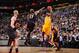 PHOENIX, AZ - JANUARY 30: Kobe Bryant #24 of the Los Angeles Lakers goes for a jump shot against P.J. Tucker #17 of the Phoenix Suns during the game between the Los Angeles Lakers and the Phoenix Suns at US Airways Center on January 30, 2013 in Phoenix, Arizona. NOTE TO USER: User expressly acknowledges and agrees that, by downloading and/or using this Photograph, user is consenting to the terms and conditions of the Getty Images License Agreement. Mandatory Copyright Notice: Copyright 2013 NBAE (Photo by Andrew D. Bernstein/NBAE via Getty Images)