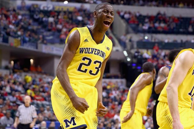 INDIANAPOLIS, IN - MARCH 14:  Caris LeVert #23 of the Michigan Wolverines celebrates in the game against the Illinois Fighting Illini during the Quarterfinals of the Big Ten Basketball Tournament at Bankers Life Fieldhouse on March 14, 2014 in Indianapolis, Indiana.  (Photo by Andy Lyons/Getty Images)