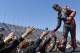 Jeff Gordon (24) greets with fans during drivers introduction before the NASCAR Sprint Cup series auto race at Chicagoland Speedway in Joliet, Ill., Sunday, Sept. 14, 2014. (AP Photo/Paul J. Bergstrom)