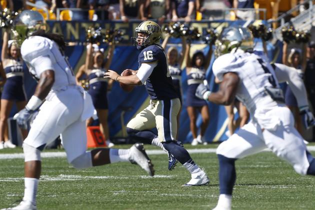 Pittsburgh quarterback Chad Voytik (16) plays in the first half of the NCAA football game between Pittsburgh and Akron on Saturday, Sept. 27, 2014 in Pittsburgh. (AP Photo/Keith Srakocic)
