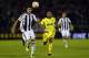 Partizan Belgrade's Lazar Cirkovic, left, and Tottenham Hotspur's Aaron Lennon clash for the ball during the Europa League Group C soccer match between Partizan Belgrade and Tottenham Hotspur in Belgrade, Serbia, Thursday, Sept. 18, 2014. (AP Photo/Marko Drobnjakovic)