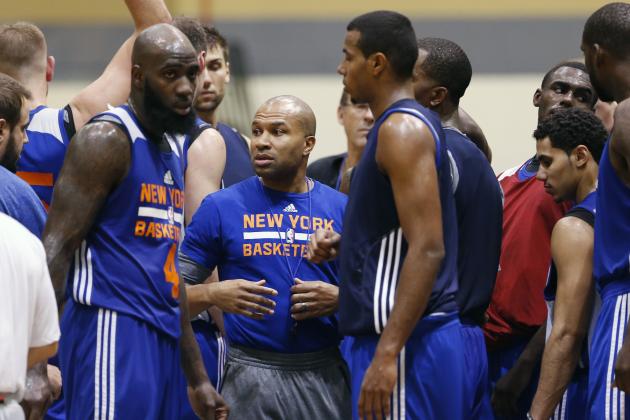 New York Knicks basketball coach Derek Fisher talks to players during practice at the team's NBA training camp at the U.S. Military Academy on Tuesday, Sept. 30, 2014, in West Point, N.Y. (AP Photo/Mike Groll)