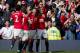 Manchester United's Radamel Falcao Garcia, right, celebrates with teammates after scoring against Everton during their English Premier League soccer match at Old Trafford Stadium, Manchester, England, Sunday Oct. 5, 2014. (AP Photo/Jon Super)