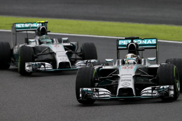 Mercedes driver Lewis Hamilton of Britain leads teammate Nico Rosberg of Germany during the Japanese Formula One Grand Prix at the Suzuka Circuit in Suzuka, central Japan, Sunday, Oct. 5, 2014. Hamilton won the race while Rosberg finished second. (AP Photo/Shuji Kajiyama)