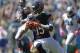 Chicago Bears' Brandon Marshall (15) runs after a catch against the Carolina Panthers during the first half of an NFL football game in Charlotte, N.C., Sunday, Oct. 5, 2014. (AP Photo/Bob Leverone)