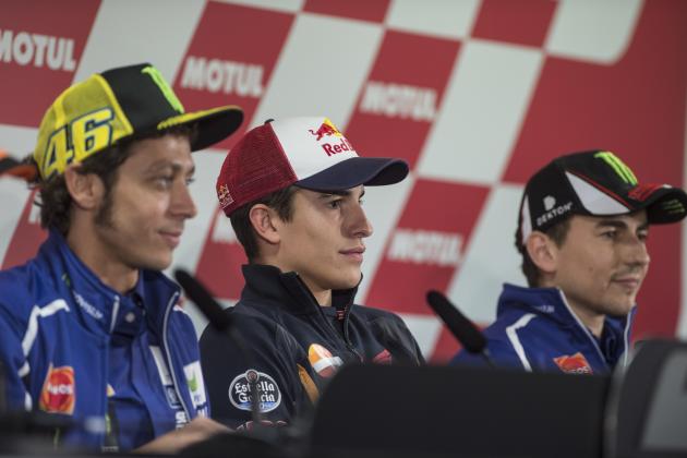MOTEGI, JAPAN - OCTOBER 09:  Marc Marquez (C) of Spain and Repsol Honda Team looks on during the press conference pre-event during the MotoGP Of Japan - Previews at Twin Ring Motegi on October 9, 2014 in Motegi, Japan.  (Photo by Mirco Lazzari gp/Getty Images)