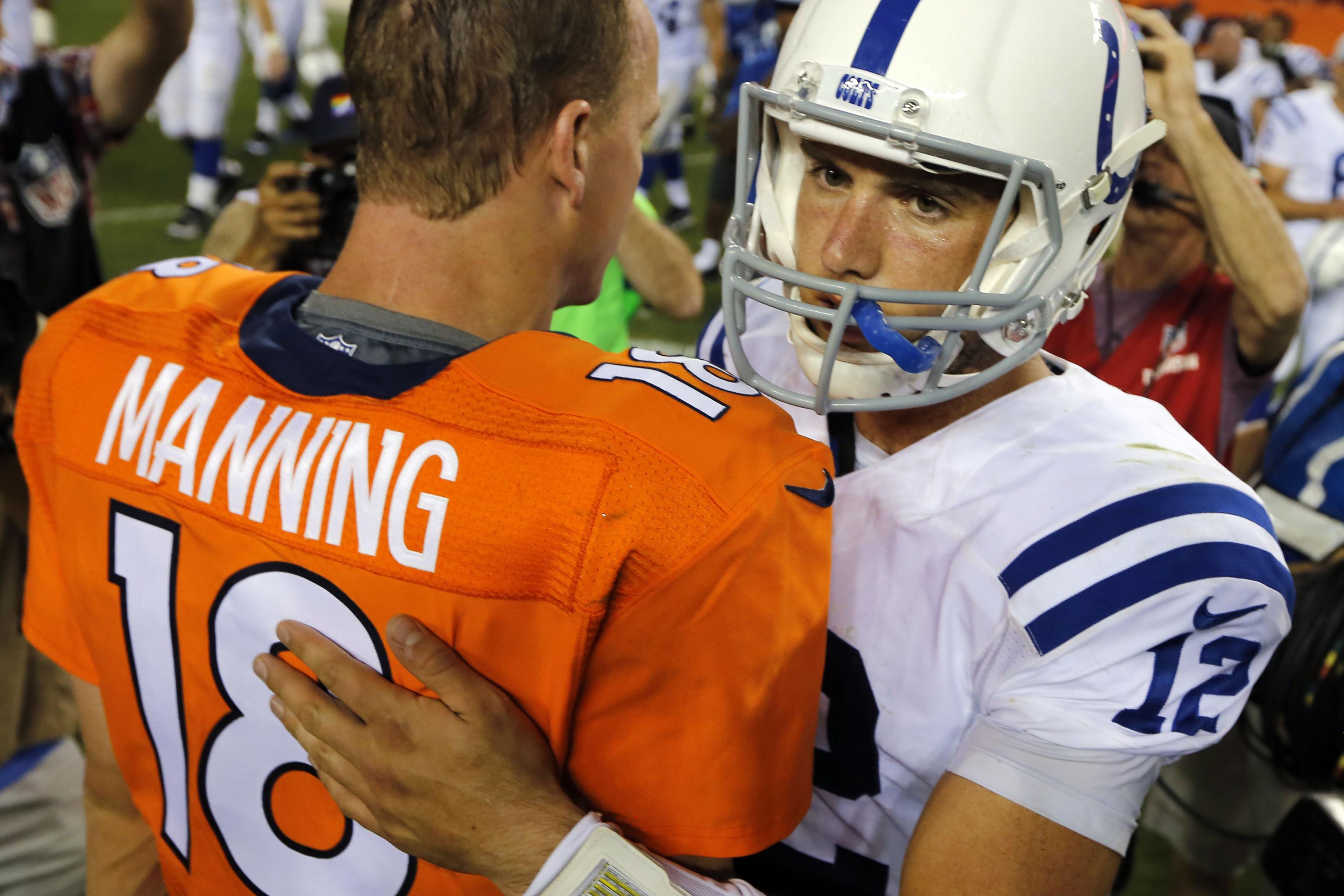 Indianapolis Colts injured quarterback Peyton Manning looks on before an  NFL football game against the Houston Texans in Indianapolis. Colts owner  Jim Irsay says if Manning plays football next season, it will