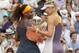 Serena Williams, seen here with Maria Sharapova at the 2013 French Open, has the Russian closing in on the No. 1 ranking.