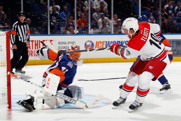 UNIONDALE, NY - SEPTEMBER 24: Jaroslav Halak #41 of the New York Islanders makes the third period save on Jiri Tlusty #19 of the Carolina Hurricanes at the Nassau Veterans Memorial Coliseum on September 24, 2014 in Uniondale, New York.  The Hurricanes defeated the Islanders 4-2. (Photo by Bruce Bennett/Getty Images)
