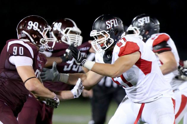 St, Francis (PA) Red Flash Thurston Kino #67 in action against the Fordham Rams during a college football game on Saturday, August 30, 2014 in the Bronx, NY. Fordham won the game 53-22. (AP Photo/Gregory Payan)