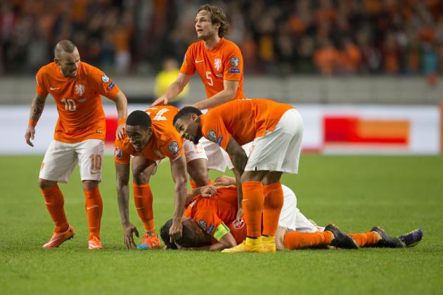 Netherlands players celebrate scoring their second gaol during the Euro 2016 qualifying match between The Netherlands and Kazakhstan at ArenA stadium in Amsterdam, Netherlands, Friday, Oct. 10, 2014. The match ended in a 3-1 score for The Netherlands. (AP Photo/Peter Dejong)