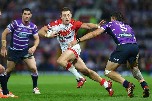 MANCHESTER, ENGLAND - OCTOBER 11:  James Roby (C) of St Helens holds off Anthony Gelling (R) of Wigan during the First Utility Super League Grand Final match between St Helens and Wigan Warriors at Old Trafford on October 11, 2014 in Manchester, England.  (Photo by Michael Steele/Getty Images)