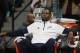 Oklahoma City Thunder forward Kevin Durant sits on bench before facing Denver Nuggets in the first quarter of an NBA exhibition basketball game in Denver on Wednesday, Oct. 8, 2014. (AP Photo/David Zalubowski)