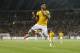 Brazil's Neymar celebrates after scoring the forth goal during an international friendly soccer match in Singapore, Tuesday, Oct. 14, 2014. (AP Photo/Wong Maye-E)