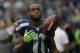 Seattle Seahawks wide receiver Percy Harvin stands on the sideline late in the second half of the Seattle Seahawks' 30-23 loss to the Dallas Cowboys in an NFL football game, Sunday, Oct. 12, 2014, in Seattle. (AP Photo/Elaine Thompson)