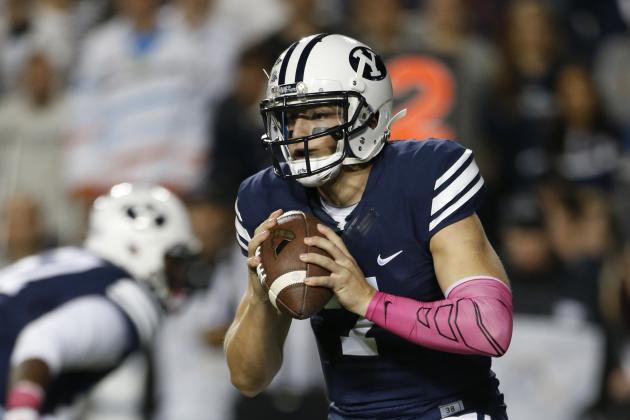 BYU quarterback Christian Stewart looks to pass against Nevada during the first half of an NCAA college football game in Provo, Utah, Saturday, Oct. 18, 2014. Nevada beat BYU 42-35. (AP Photo/George Frey)