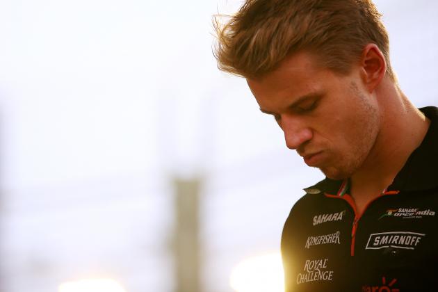 SINGAPORE - SEPTEMBER 21:  Nico Hulkenberg of Germany and Force India arrives for the drivers' parade before the Singapore Formula One Grand Prix at Marina Bay Street Circuit on September 21, 2014 in Singapore, Singapore.  (Photo by Mark Thompson/Getty Images)