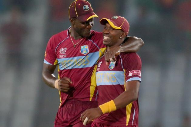 DHAKA, BANGLADESH - APRIL 01:  Darren Sammy and Dwayne Bravo of the West Indies celebrate after winning the match during the ICC World Twenty20 Bangladesh 2014 match between West Indies and Pakistan at Sher-e-Bangla Mirpur Stadium on April 1, 2014 in Dhaka, Bangladesh.  (Photo by Scott Barbour/Getty Images)