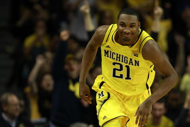 NEW YORK, NY - DECEMBER 21: Zak Irvin #21 of the Michigan Wolverines reacts during action against the Stanford Cardinals during the Brooklyn Hoops Holiday Invitational at Barclays Center on December 21, 2013 in the Brooklyn borough of New York City. The Wolverines defeated the Cardinals 68-65. (Photo by Adam Hunger/Getty Images)