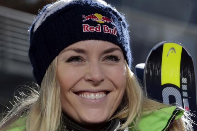 Ski racer Lindsey Vonn of the U.S. laughs during training at the Rettenbach glacier in Soelden, Austria, Saturday, Oct. 4, 2014. Vonn started her first training after her knee injury. (AP Photo/Matthias Schrader)