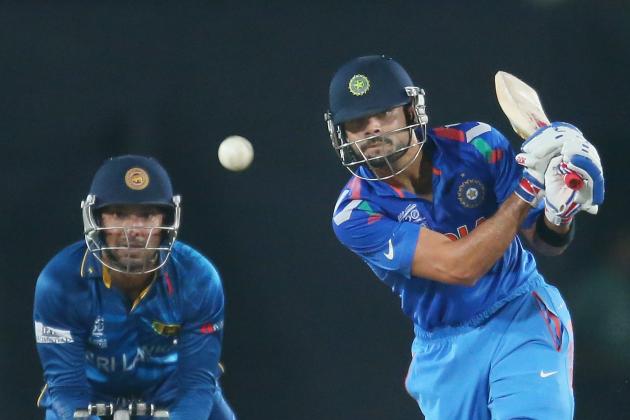 DHAKA, BANGLADESH - APRIL 06:  Virat Kohli of India bats as Kumar Sangakkara of Sri Lanka looks on during the Final of the ICC World Twenty20 Bangladesh 2014 between India and Sri Lanka at Sher-e-Bangla Mirpur Stadium on April 4, 2014 in Dhaka, Bangladesh.  (Photo by Scott Barbour/Getty Images)