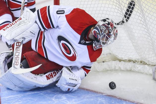 Oct 23, 2014; Calgary, Alberta, CAN; Carolina Hurricanes goalie Cam Ward (30) reacts to the goal scored by Calgary Flames center Matt Stajan (not pictured) during the second period at Scotiabank Saddledome. Mandatory Credit: Sergei Belski-USA TODAY Sports