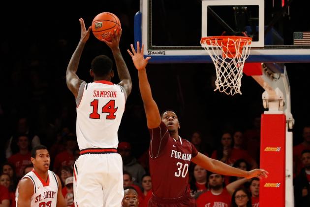 Dec 7, 2013; New York, NY, USA;  St. John's Red Storm forward Jakarr Sampson (14) shoots over Fordham Rams forward Ryan Rhoomes (30) during the first half at Madison Square Garden. Mandatory Credit: Anthony Gruppuso-USA TODAY Sports