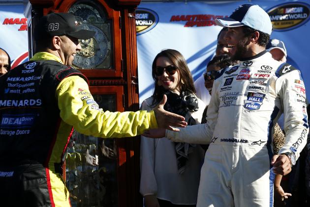 MARTINSVILLE, VA - OCTOBER 25:  Matt Crafton, driver of the #88 Ideal Door/Menards Toyota, left, congratulates Darrell Wallace, Jr., driver of the #34 2015 NASCAR Hall of Fame Inductee Wendell Scott Toyota, in Victory Lane after Wallace's victory in the NASCAR Camping World Truck Series Kroger 200 at Martinsville Speedway on October 25, 2014 in Martinsville, Virginia.  (Photo by Jeff Zelevansky/Getty Images)