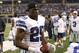 Dallas Cowboys running back DeMarco Murray (29) works with a football on the sidelines during the second half of an NFL football game against the Washington Redskins, Monday, Oct. 27, 2014, in Arlington, Texas. (AP Photo/Brandon Wade)