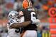 Oakland Raiders linebacker Khalil Mack (52) hits Cleveland Browns quarterback Brian Hoyer after an incomplete pass in the third quarter of an NFL football game Sunday, Oct. 26, 2014, in Cleveland. (AP Photo/David Richard)