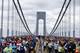 Runners cross the Verrazano-Narrows Bridge at the start of the New York City Marathon, Sunday, Nov. 2, 2014, in New York. (AP Photo/Jason DeCrow)