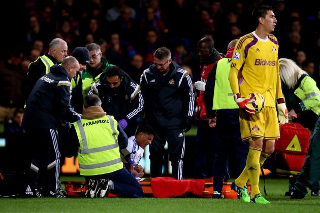 LONDON, ENGLAND - NOVEMBER 03:  Patrick van Aanholt of Sunderland is stretchered off the pitch due to injury during the Barclays Premier League match between Crystal Palace and Sunderland at Selhurst Park on November 3, 2014 in London, England.  (Photo by Ian Walton/Getty Images)
