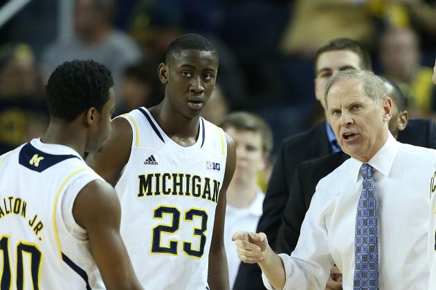 ANN ARBOR, MI - FEBRUARY 05: University of Michigan head coach John Beilein talks with Derrick Walton Jr #10 Caris LeVert #23 and Nik Stauskas #11 during the first half of the game against the Nebraska Cornhuskers at Crisler Arena on February 5, 2014 in Ann Arbor, Michigan. The Wolverines defeated the Cornhuskers 79-50. (Photo by Leon Halip/Getty Images)