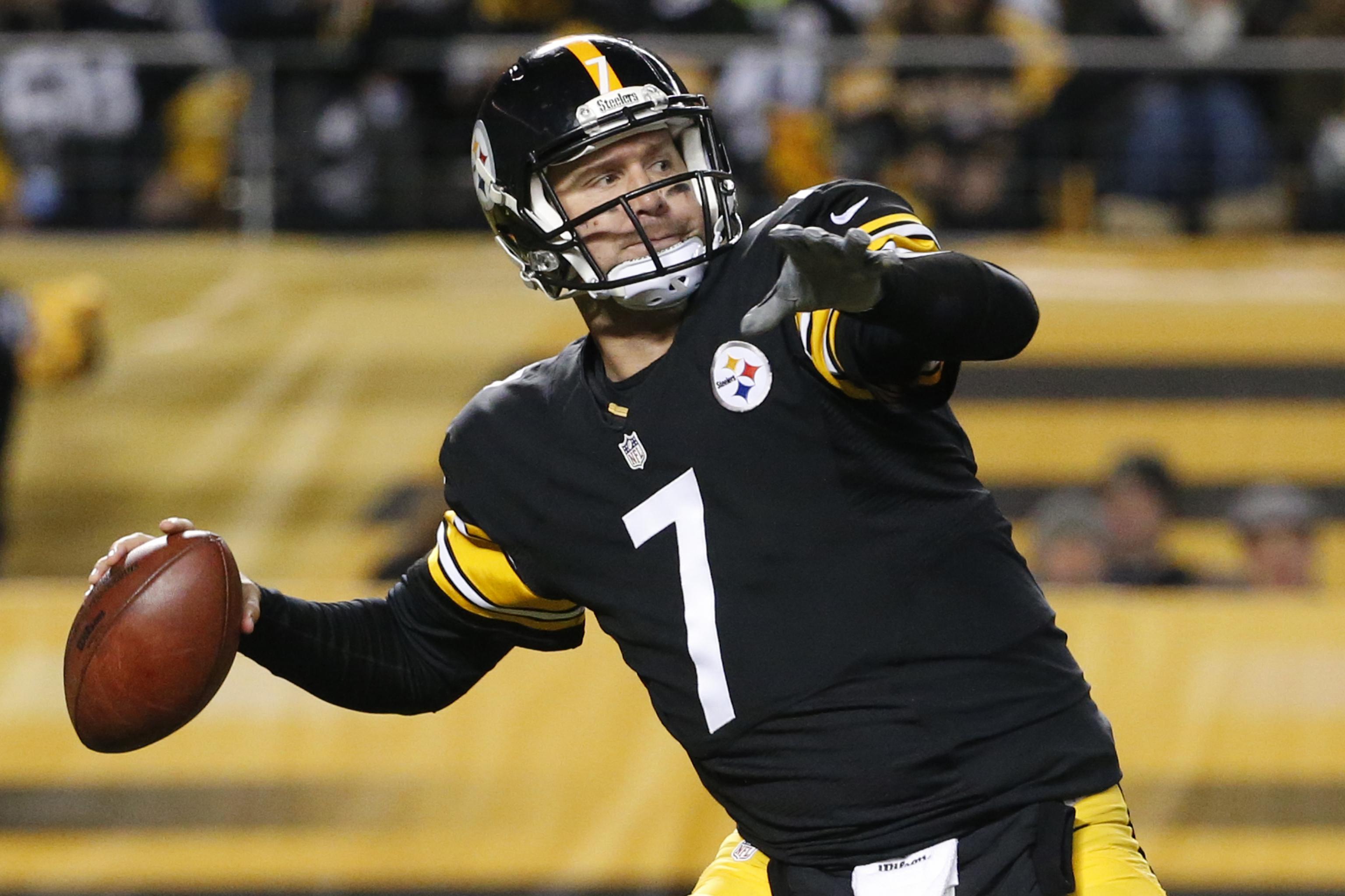 Pittsburgh Steelers quarterback Ben Roethlisberger runs from Ravens  pressure during the second half of their game on Sunday, November 6, 2011,  won by Baltimore 23-20 in Pittsburgh, Pennsylvania. (Photo by Doug  Kapustin/MCT/Sipa