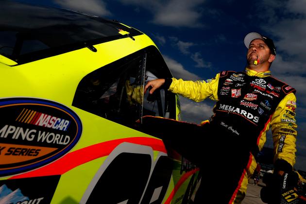FORT WORTH, TX - OCTOBER 30:  Matt Crafton, driver of the #88 Goof Off/Menards Toyota, climbs from his truck following practice for the NASCAR Camping World Truck Series WinStar World Casino & Resort 350 at Texas Motor Speedway on October 30, 2014 in Fort Worth, Texas.  (Photo by Sean Gardner/Getty Images for Texas Motor Speedway)