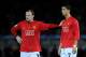 YOKOHAMA, JAPAN - DECEMBER 21: Wayne Rooney of Manchester United with team-mate Cristiano Ronaldo during the FIFA Club World Cup Japan 2008 Final match between Manchester United and Liga De Quito at the International Stadium Yokohama on December 21, 2008 in Yokohama, Kanagawa, Japan. (Photo by Shaun Botterill/Getty Images)