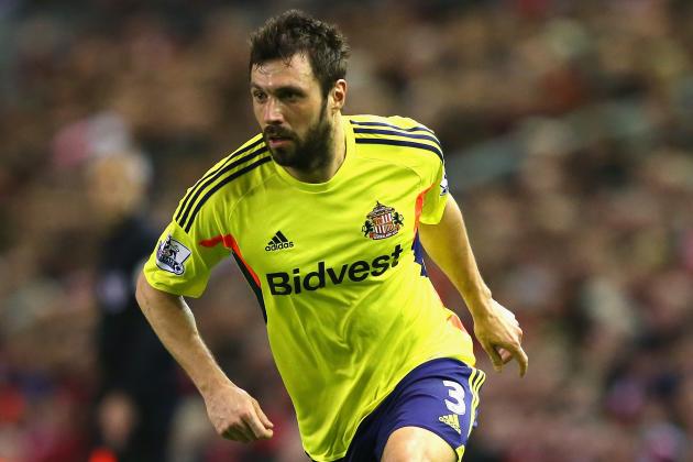 LIVERPOOL, ENGLAND - MARCH 26: Andrea Dossena of Sunderland in action during the Barclays Premier League match between Liverpool and Sunderland at Anfield on March 26, 2014 in Liverpool, England. (Photo by Alex Livesey/Getty Images)
