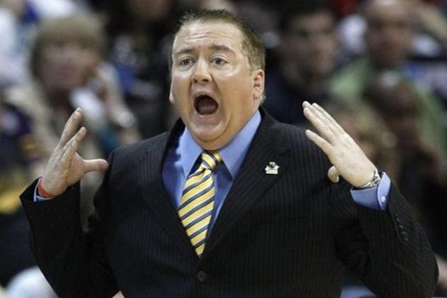 FILE - In this March 17, 2011, file photo, Morehead State coach Donnie Tyndall reacts during the first half against Louisville in a Southwest regional second round NCAA tournament college basketball game in Denver. A person familiar with the move says Southern Miss has agreed to terms with Morehead State's Donnie Tyndall to be the next Golden Eagles men's basketball coach. The person spoke to The Associated Press Saturday on condition of anonymity because no announcement by either school had been made. The person says Tyndall has agreed to a four-year deal and that he is expected to be introduced Monday. (AP Photo/Ed Andrieski, File)