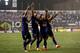 SANTOS, BRAZIL - NOVEMBER 05: The team of Cruzeiro celebrates scoring the second goal during the match between Santos and Cruzeiro for Copa do Brasil 2014 at Vila Belmiro Stadium on November 5, 2014 in Santos, Brazil. (Photo by Friedemann Vogel/Getty Images)