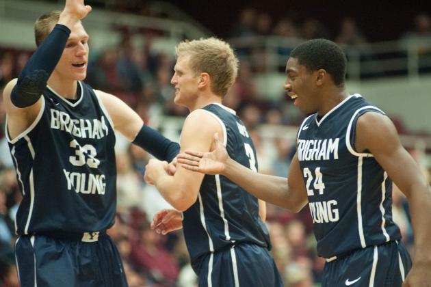 Nov 11, 2013; Stanford, CA, USA; Brigham Young Cougars guard Frank Bartley IV (24) high fives Cougars forward Nate Austin (33) during a timeout in the game against the Stanford Cardinal at Maples Pavilion. Mandatory Credit: Ed Szczepanski-USA TODAY Sports